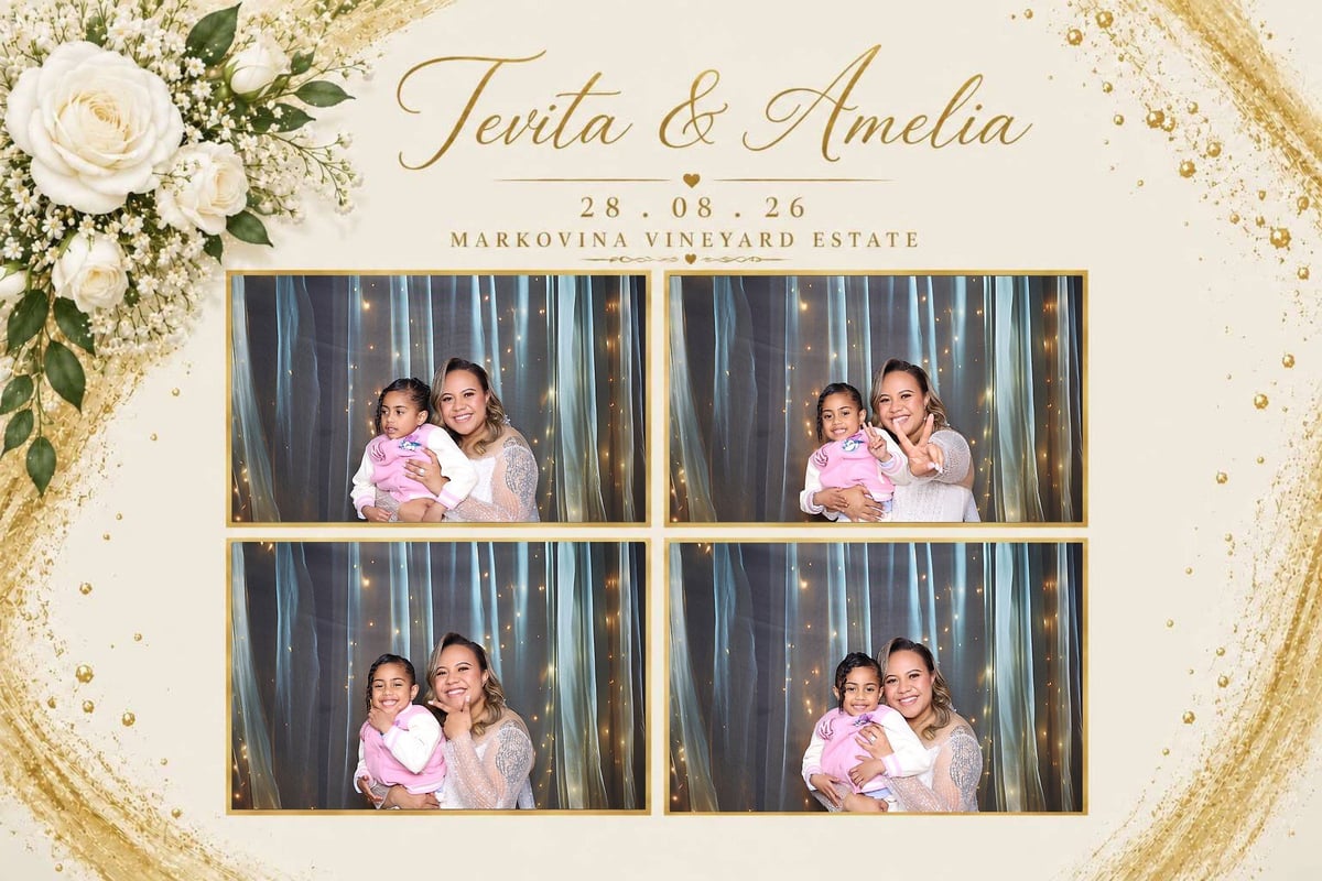 Wedding photo booth strip with gold accents and flowers